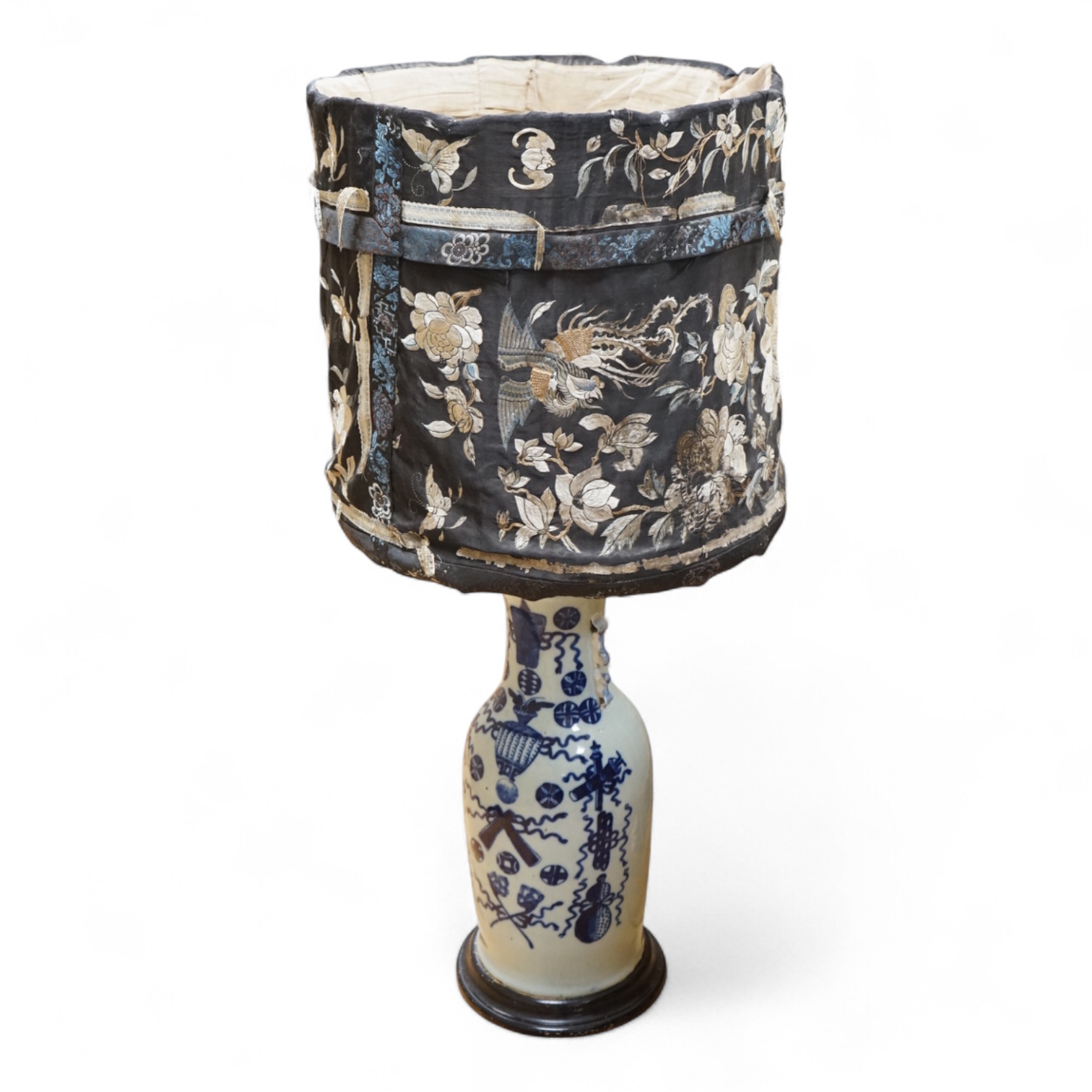 A 19th century Chinese underglaze blue celadon ground baluster vase, mounted as a table lamp, with Chinese silk embroidered shade, 112cm high including shade.
